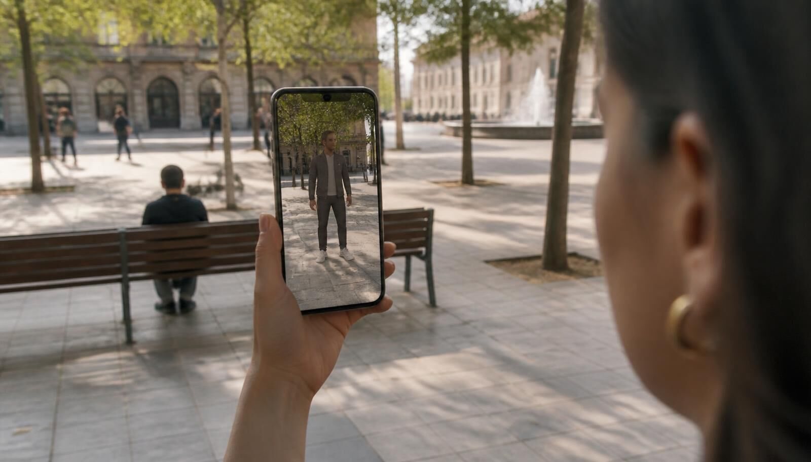 Phone placing a life-size figure in a real plaza